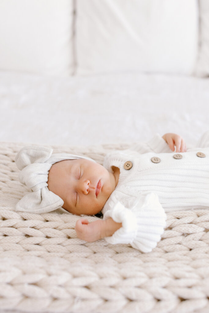 baby sleeping on blanket during indianapolis newborn photos