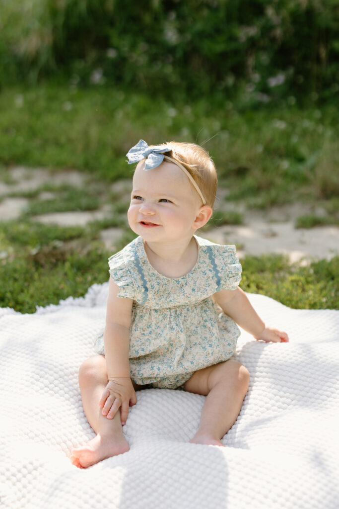 little girl smiling towards the right during Indianapolis Milestone Photography session