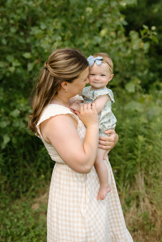 Mom holding little girl during Indianapolis Milestone Photography session