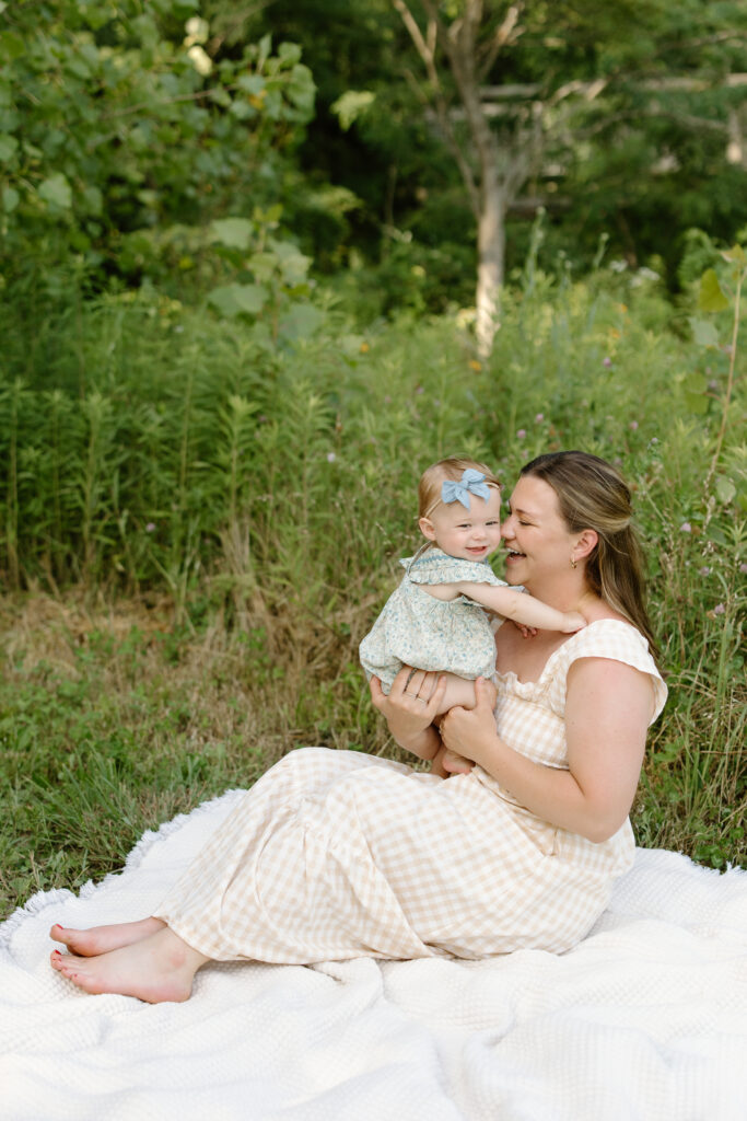 Mom nuzzling into little girl during Indianapolis Milestone Photography session