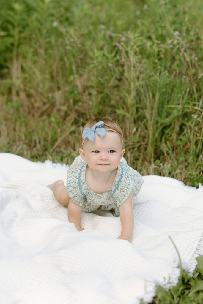 Baby girl crawling towards camera during Indianapolis Milestone Photography session