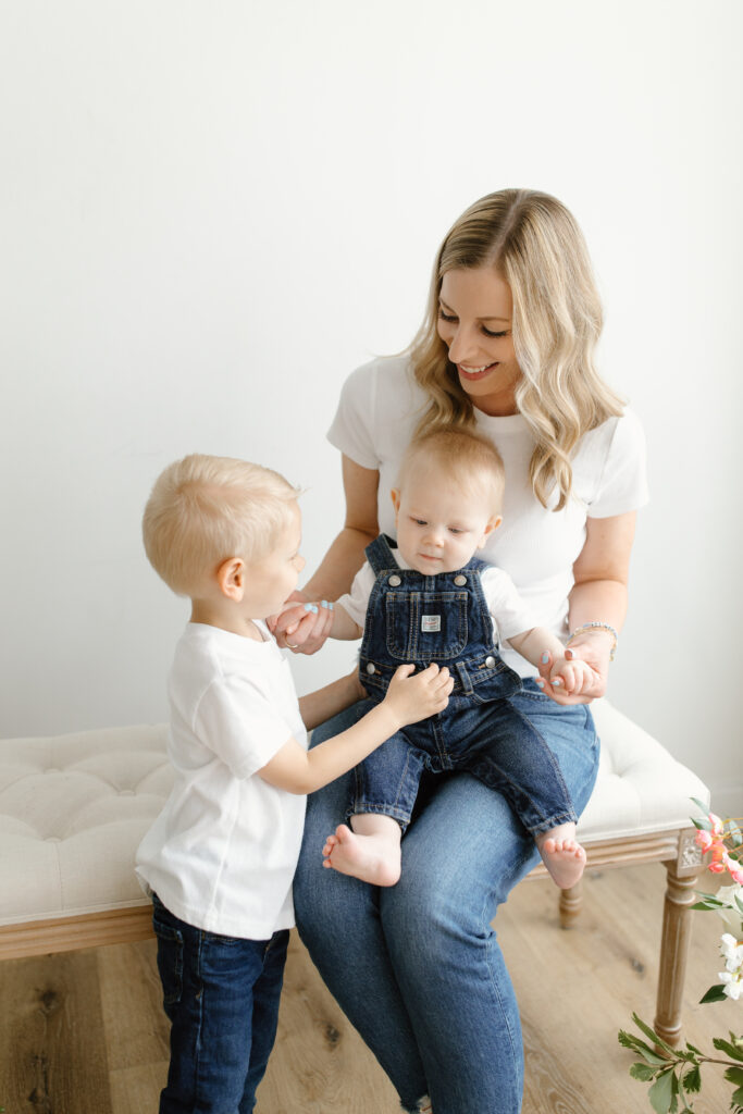 Mom playing with sons during Mother's Day Mini Sessions at Aspiring Eden Studio in Indianapolis