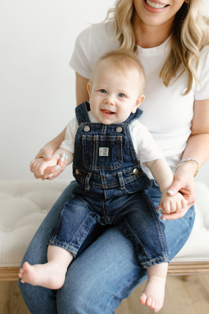 Baby boy smiling to camera during Mother's Day Mini Sessions at Aspiring Eden Studio in Indianapolis