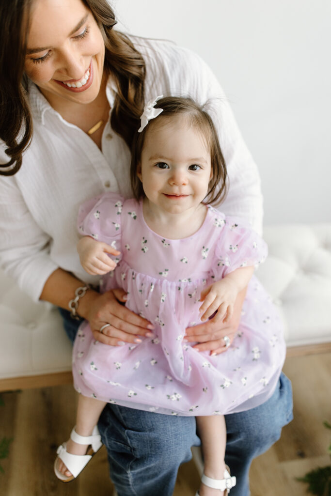 Little girl smiling to camera during Mother's Day Mini Sessions at Aspiring Eden Studio in Indianapolis