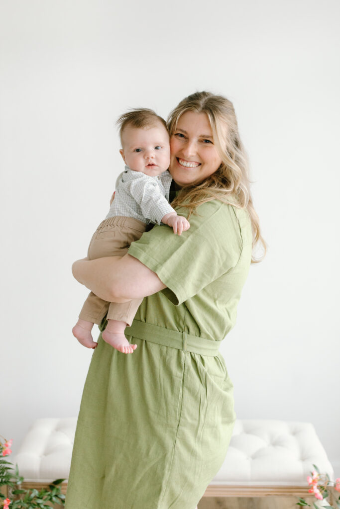 Mom and son smiling to camera during Mother's Day Mini Sessions at Aspiring Eden Studio in Indianapolis