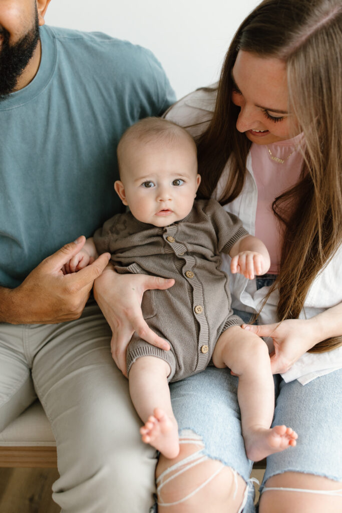 Baby boy looking towards camera during Mother's Day Mini Sessions at Aspiring Eden Studio in Indianapolis