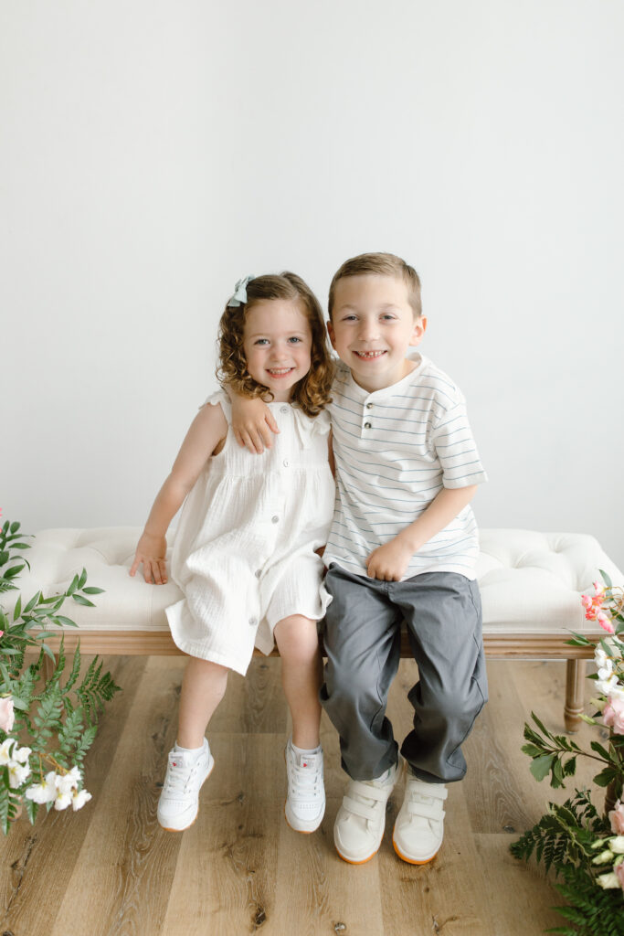 Kids hugging during Mother's Day Mini Sessions at Aspiring Eden Studio in Indianapolis