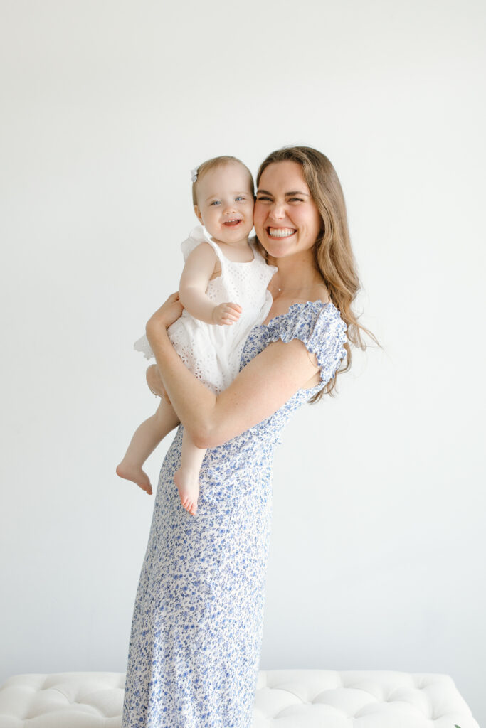 Mom and daughter hugging during Mother's Day Mini Sessions at Aspiring Eden Studio in Indianapolis