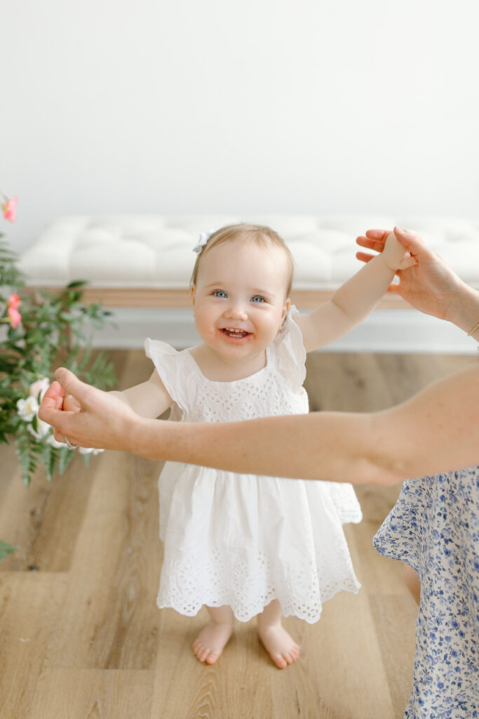 Little girl dancing during Mother's Day Mini Sessions at Aspiring Eden Studio in Indianapolis