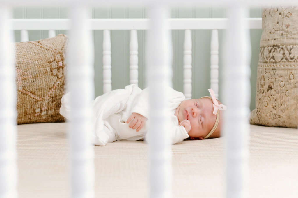 little girl sleeping during newborn photos in Fishers, IN
