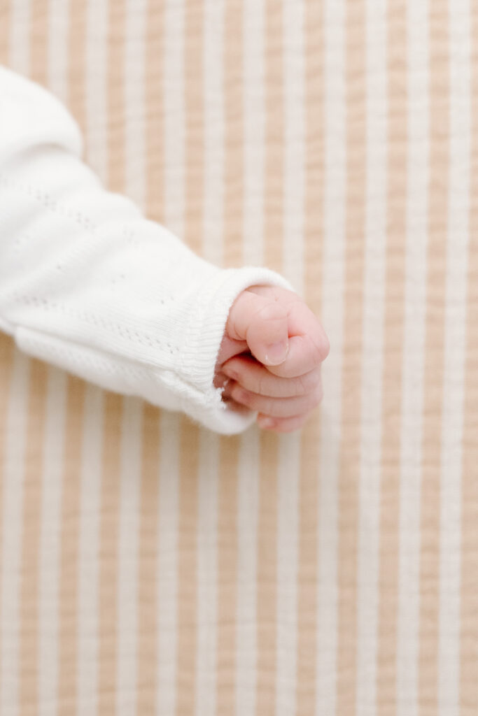 detail photo of hand during newborn photos in Fishers, IN