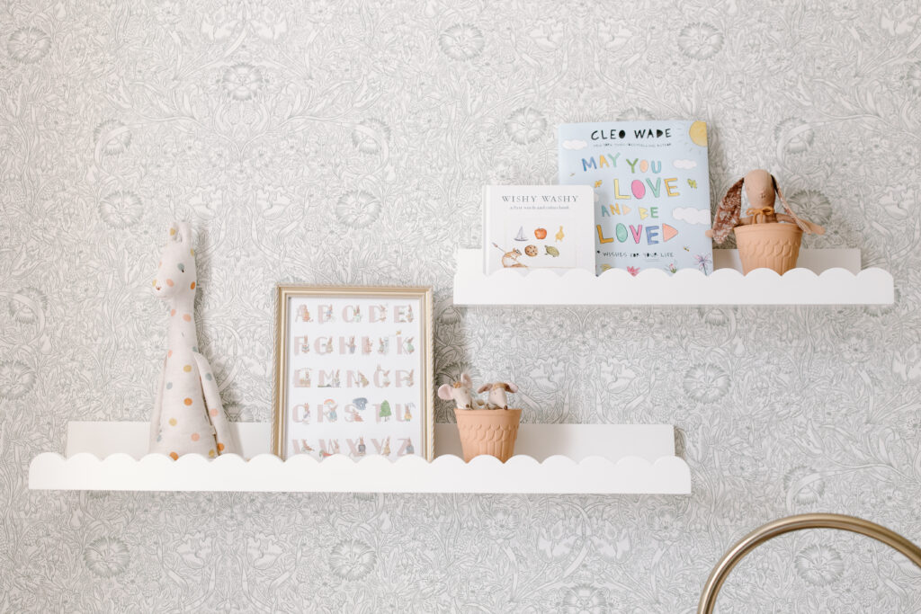 detail photo of shelves in nursery during newborn photos in Fishers, IN
