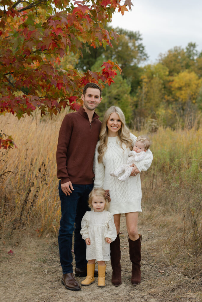 Cute family smiling during Fall Mini Sessions at West Park with Capturing Simplicity Photography