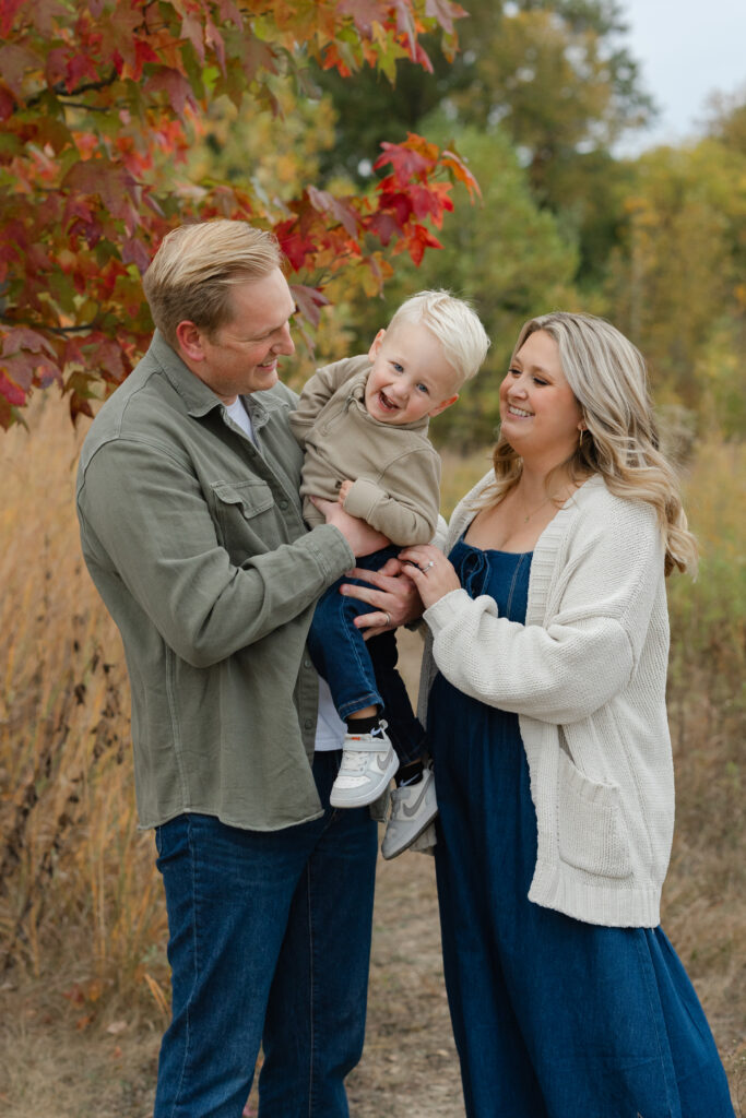 Little boy laughing during Fall Mini Sessions at West Park with Capturing Simplicity Photography