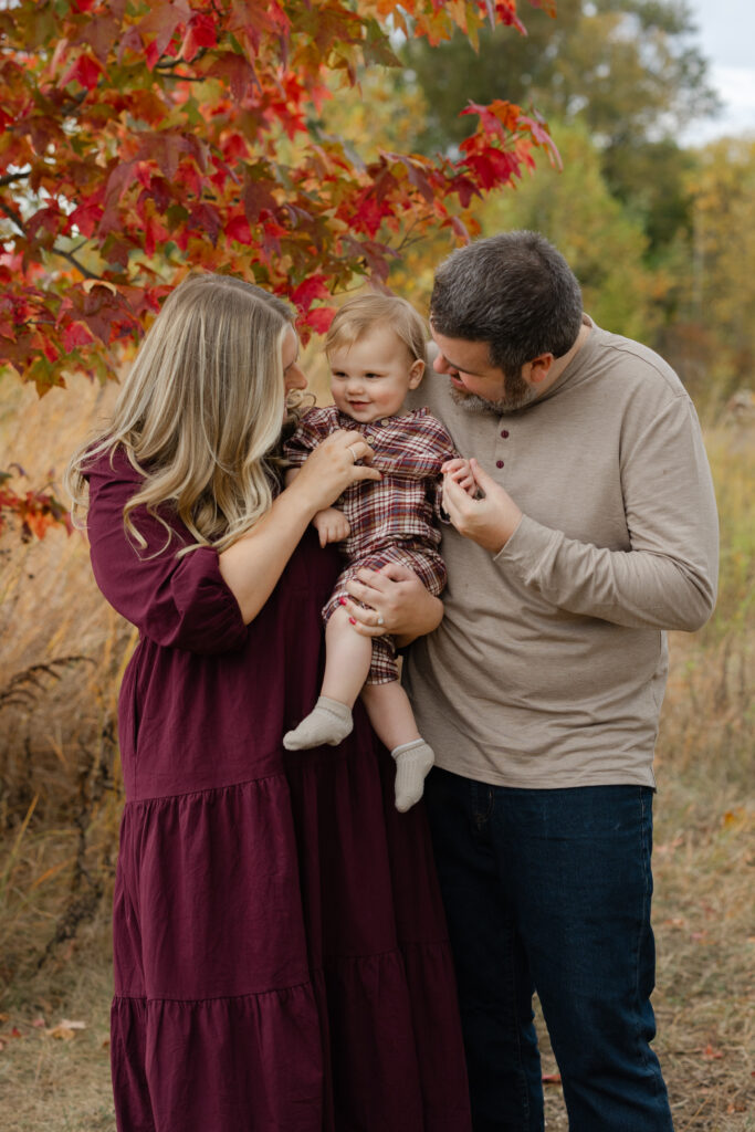Baby boy smiling during Fall Mini Sessions at West Park with Capturing Simplicity Photography