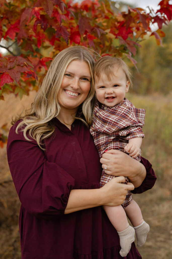 Baby boy smiling and laughing during Fall Mini Sessions at West Park with Capturing Simplicity Photography