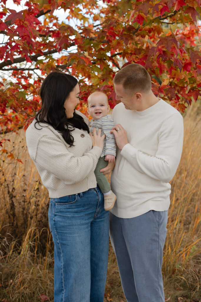 Family laughing during Fall Mini Sessions at West Park with Capturing Simplicity Photography