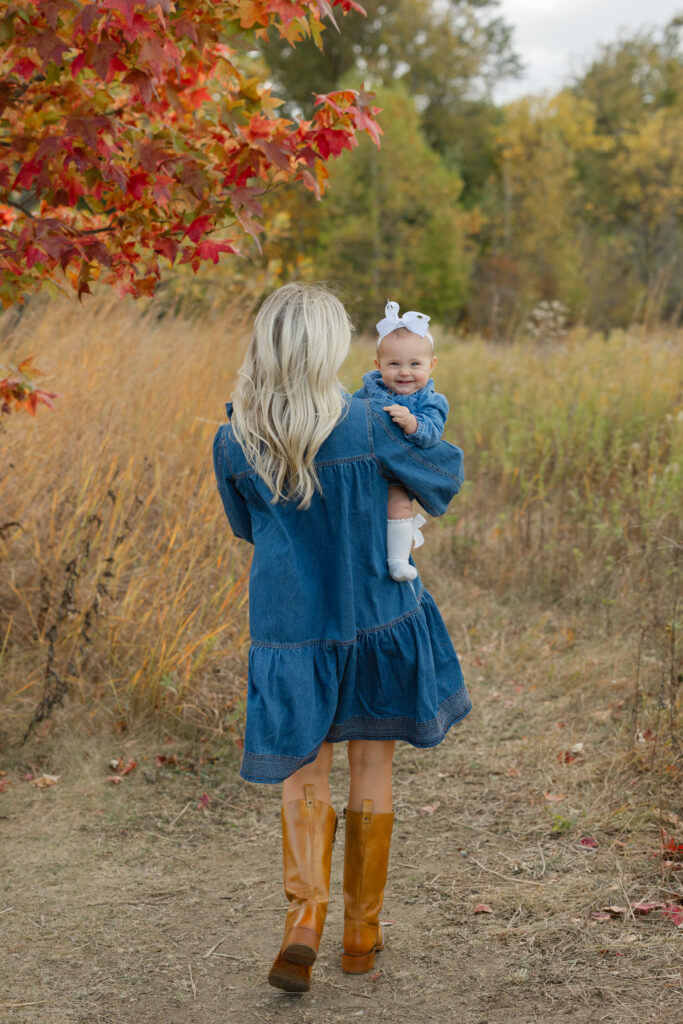 mom walking with daughter during Fall Mini Sessions at West Park with Capturing Simplicity Photography