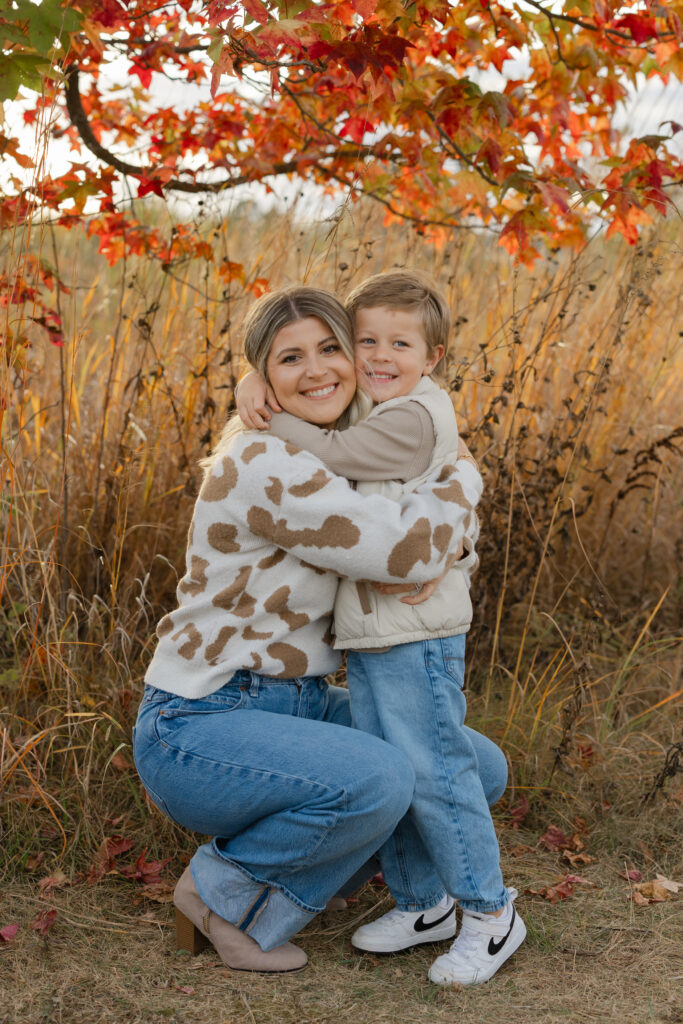 mother and son hugging during Fall Mini Sessions at West Park with Capturing Simplicity Photography