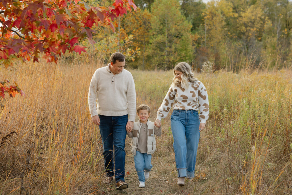 Family walking during Fall Mini Sessions at West Park with Capturing Simplicity Photography