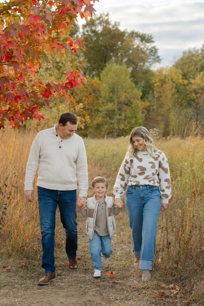 Family walking during Fall Mini Sessions at West Park with Capturing Simplicity Photography