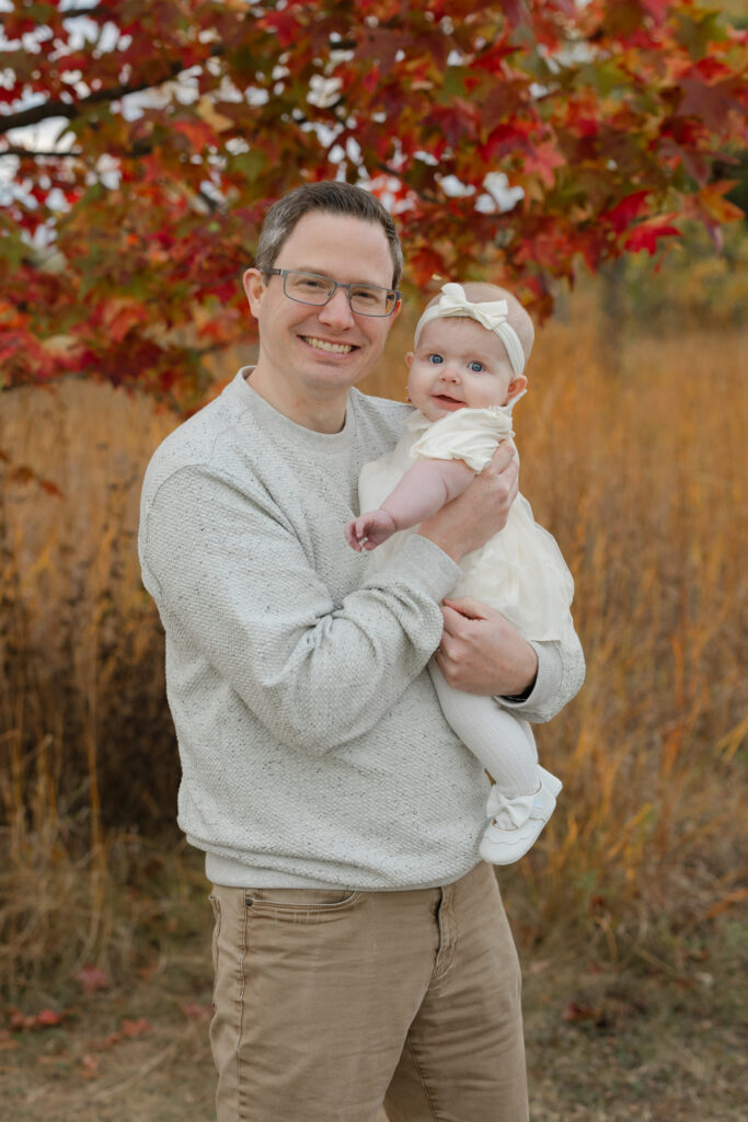 dad holding baby