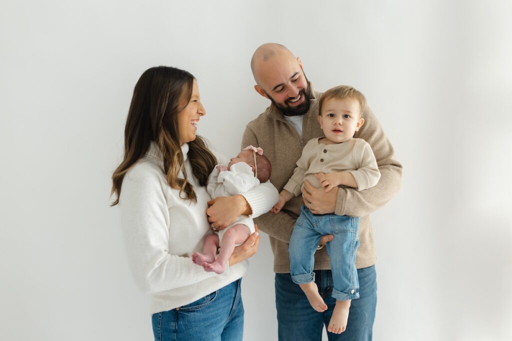 Playful family photos during newborn photos with Indianapolis Newborn Photographer Capturing Simplicity Photography