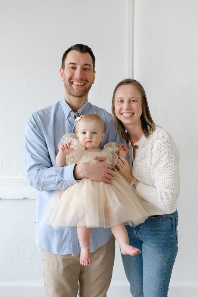Family portrait of mom, dad, and baby girl during first birthday photos in Indianapolis with Capturing Simplicity Photography